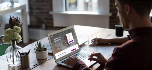 Man sitting at laptop